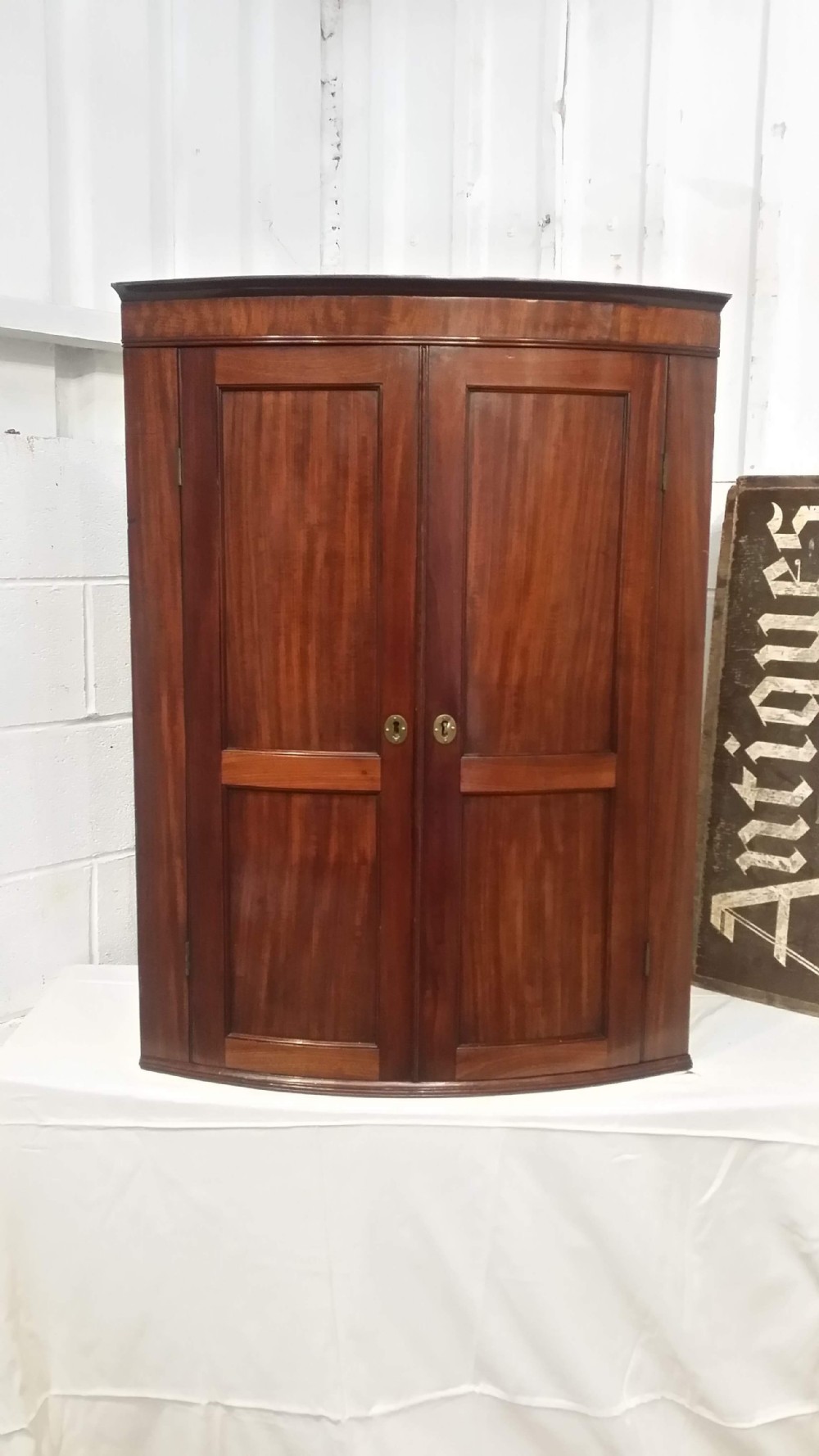 antique regency mahogany bow front corner cabinet c1820