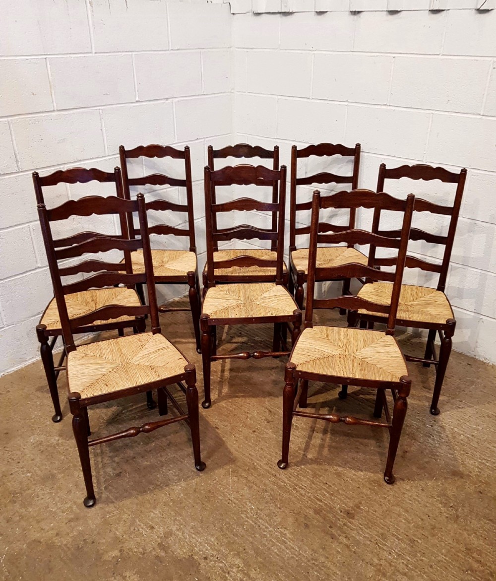 antique set eight oak ladder back dining chairs with rush seats c1910