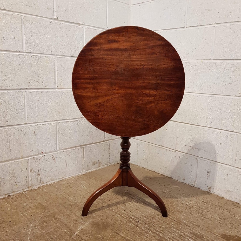 antique regency mahogany tilt top circular tripod table c1820