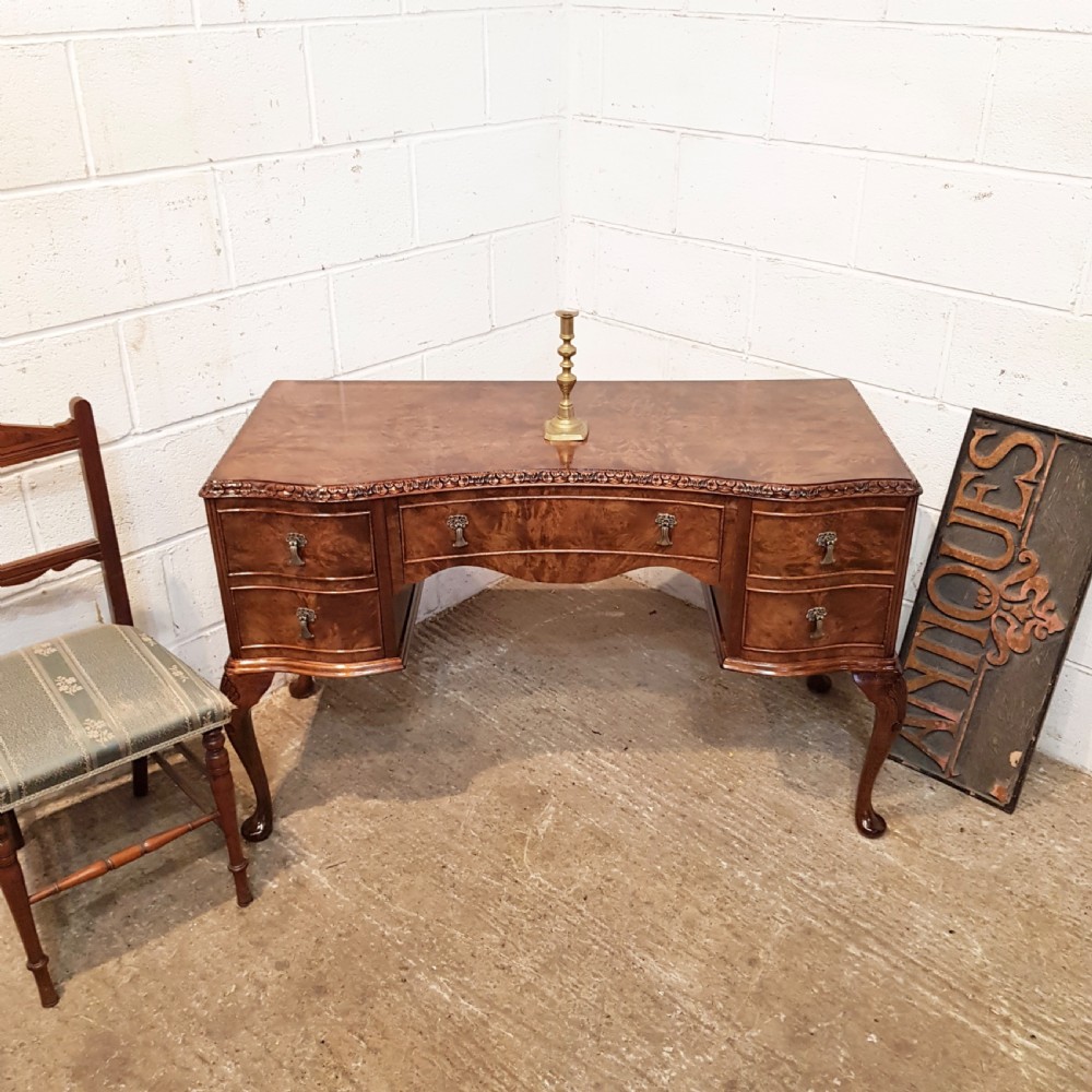 antique burr walnut serpentine shaped desk c1920