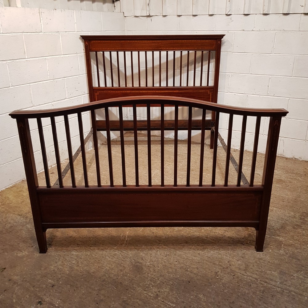 an antique edwardian mahogany king size bedstead c1900