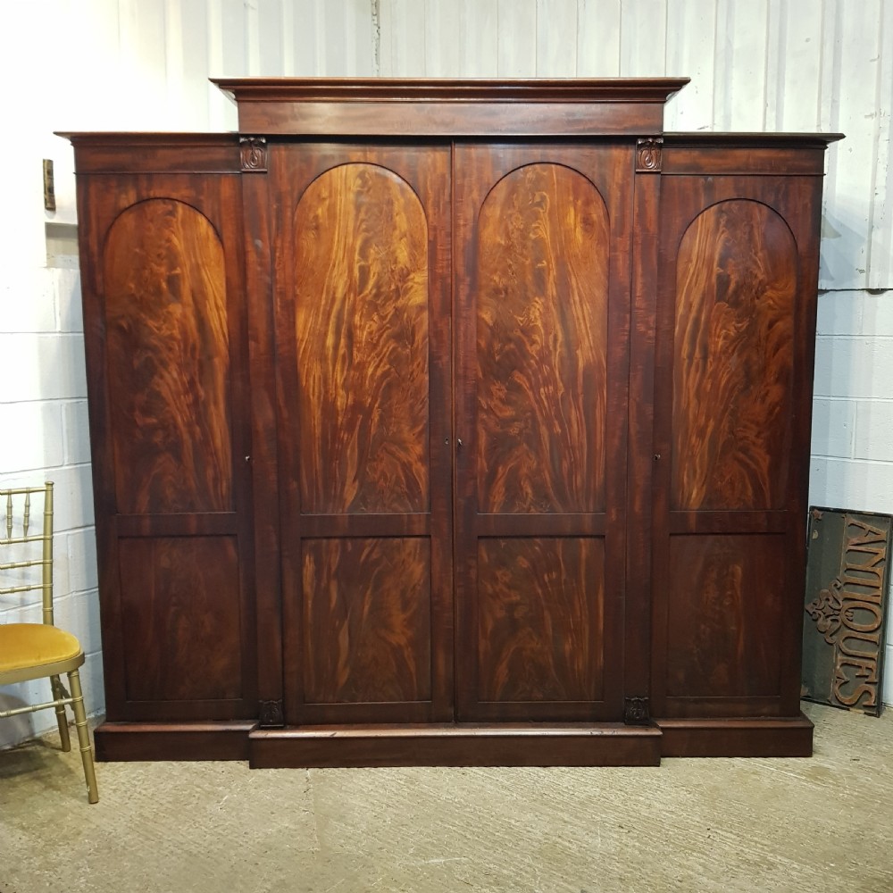 a william 4th mahogany four door breakfront triple wardrobe c1830