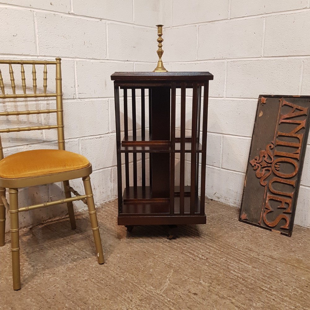 an antique mahogany revolving bookcase c1920