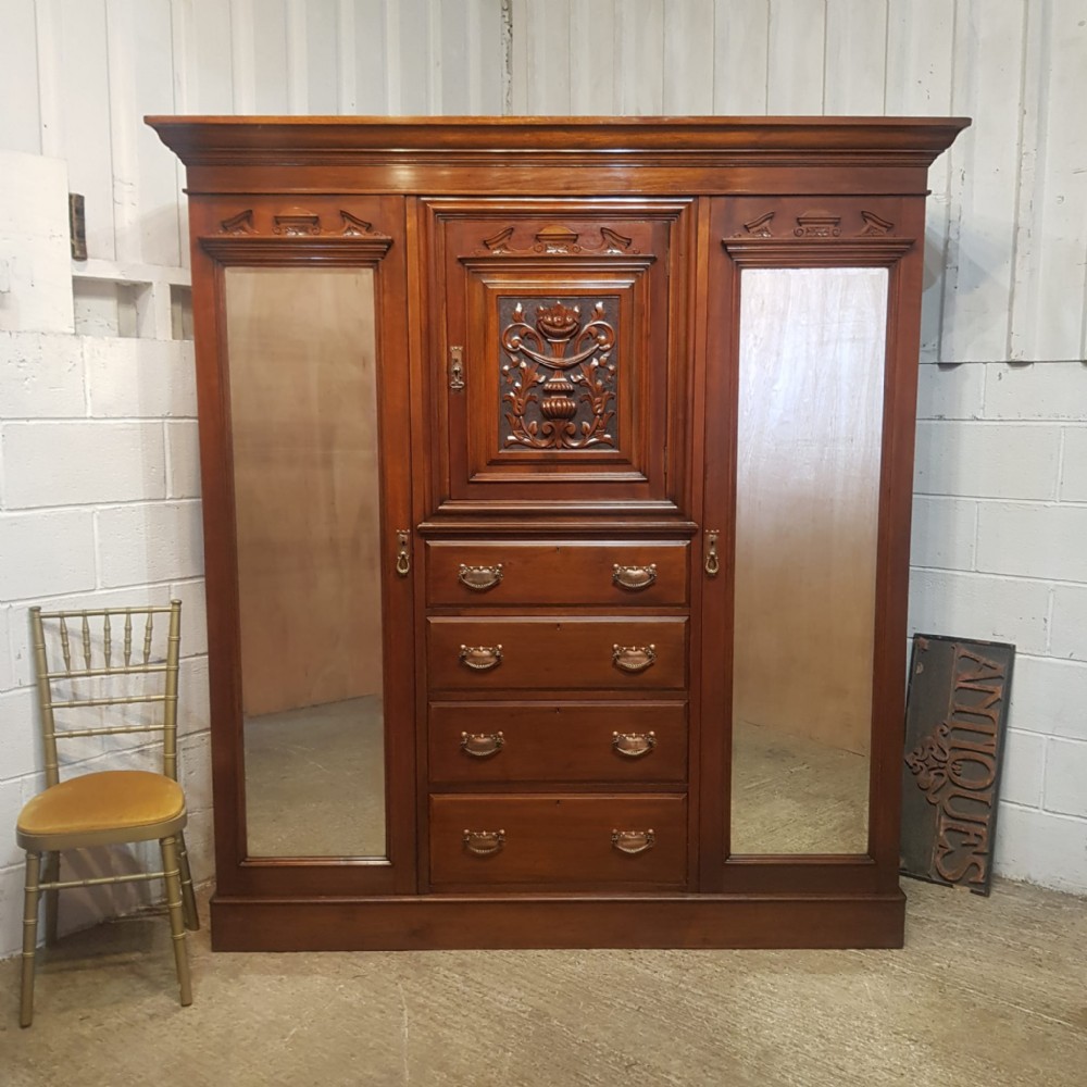 an antique edwardian walnut triple wardrobe c1900