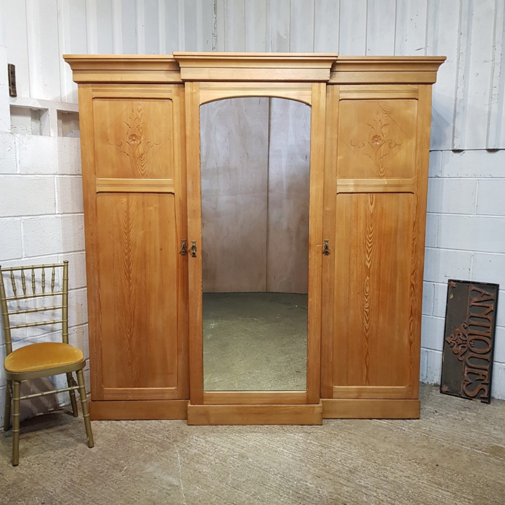 an antique ash breakfront triple wardrobe c1900