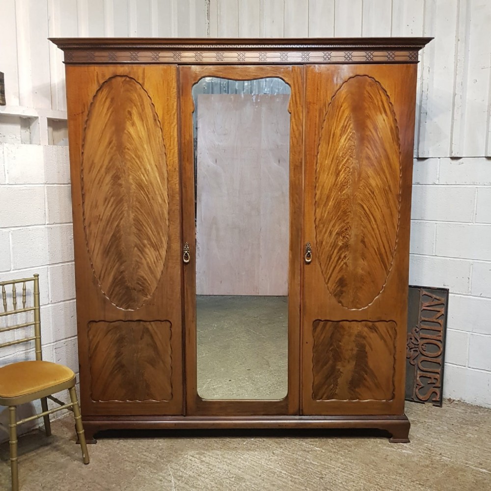 an edwardian mahogany triple wardrobe c1900