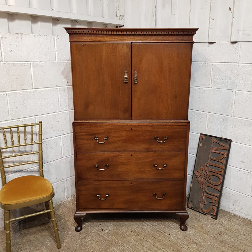 an antique mahogany tallboy c1920