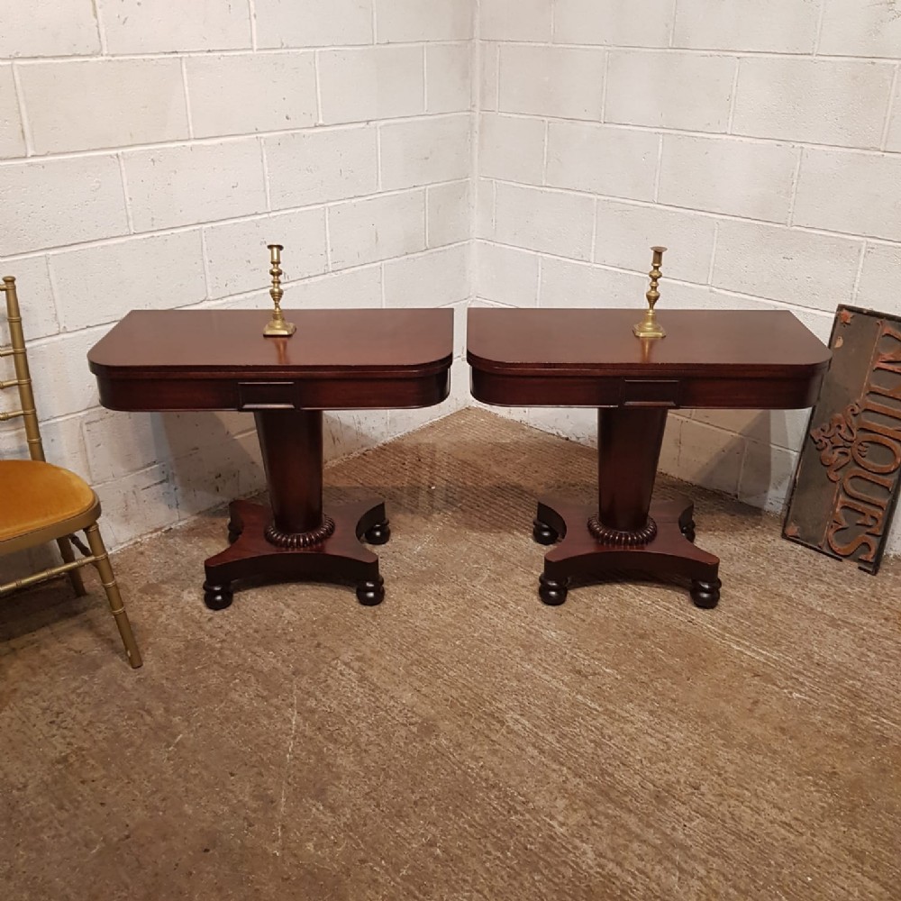 a pair of william 4th mahogany fold over tables c1830