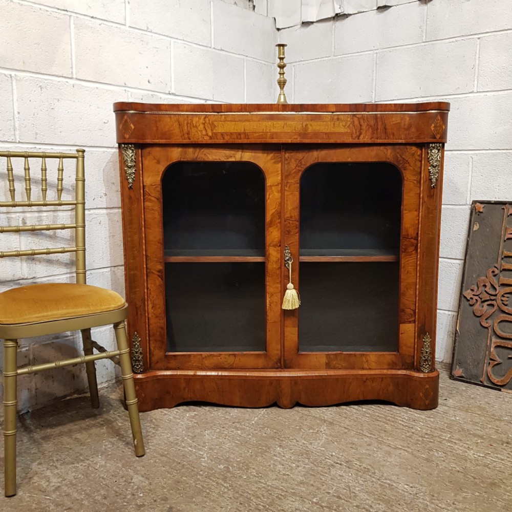 an antique burr walnut glazed bookcase c1880