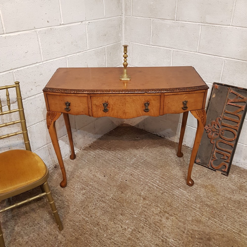 a bow fronted burr walnut console table c1920