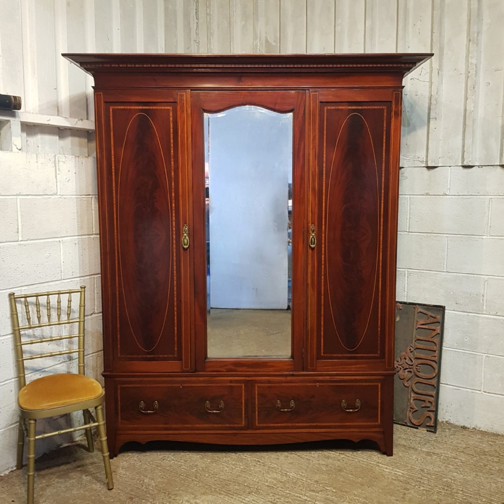 an edwardian mahogany inlaid triple wardrobe c1900
