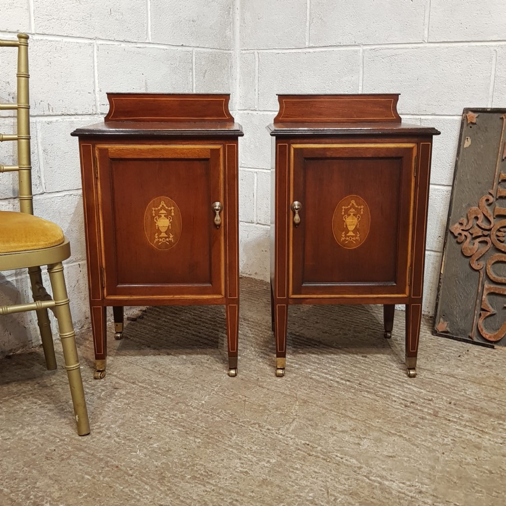 a pair of edwardian mahogany bedside cabinets c1900