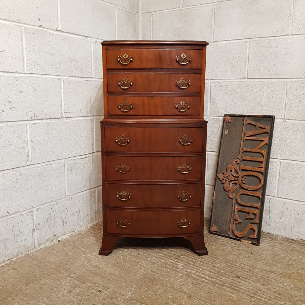 a mahogany bow fronted dwarf chest on chest c1920