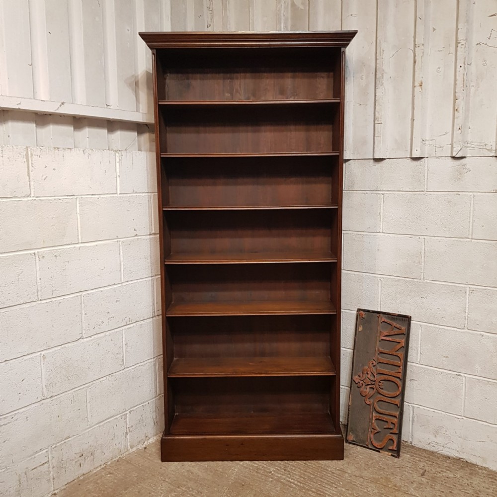 a tall oak edwardian open bookcase c1900