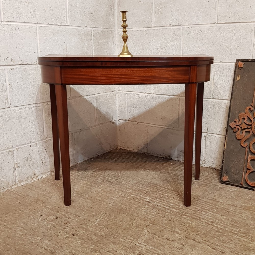 a regency mahogany d shaped fold over games table c1820