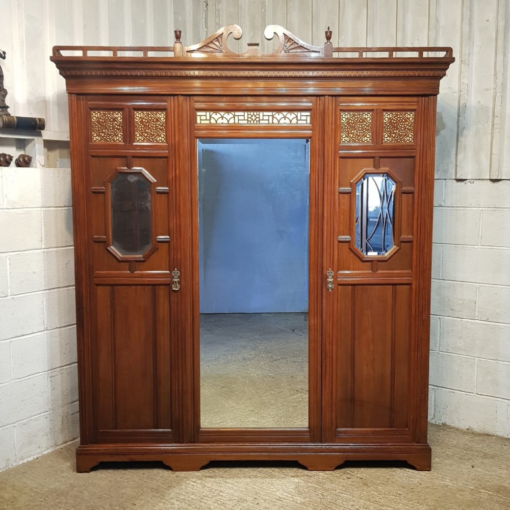 a late victorian mahogany triple wardrobe c1890