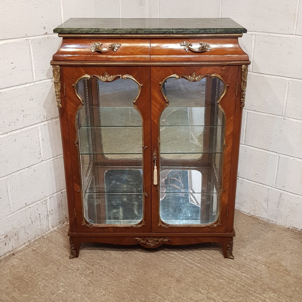 a walnut gilt metal mounted vitrine cabinet c1920