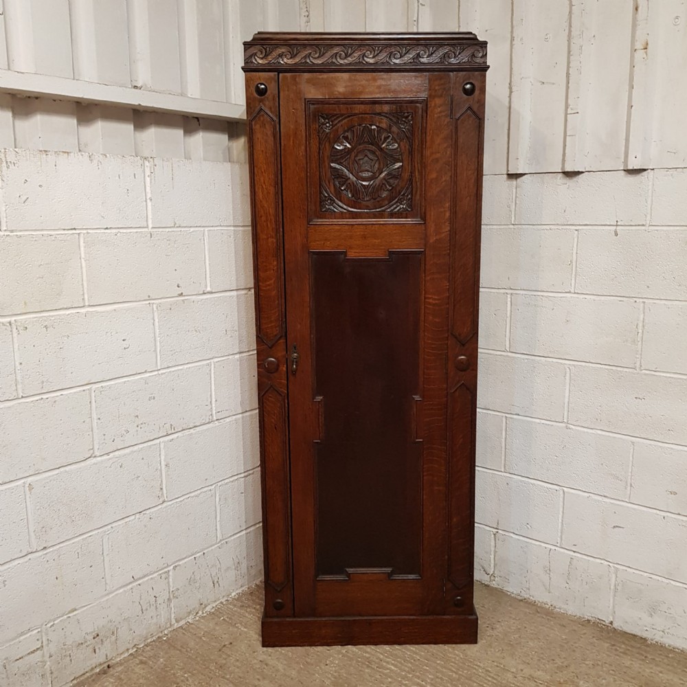 a small oak hall wardrobe c1920