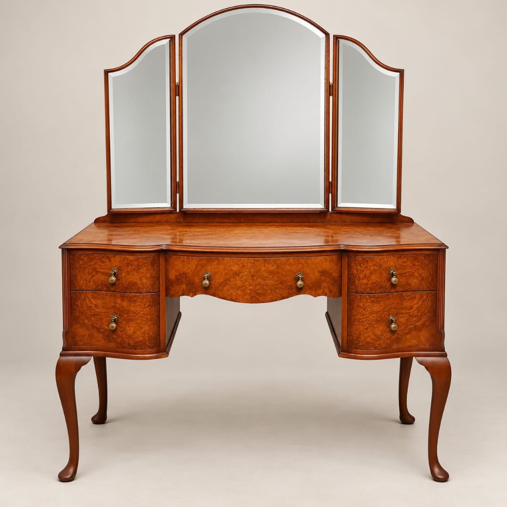 a serpentine shaped burr walnut dressing table c1920