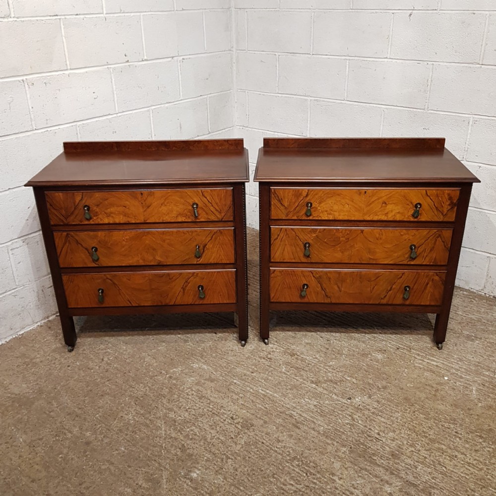 a pair of walnut and burr walnut 3ht chest of drawers c1920